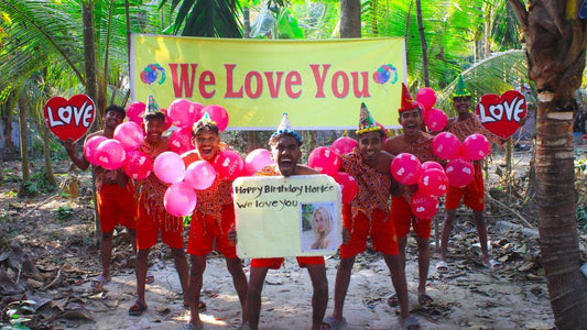 Personalised Bangladesh birthday video greeting Pinky Promise Crew holding We Love You banner with pink balloons and personalised photo sign